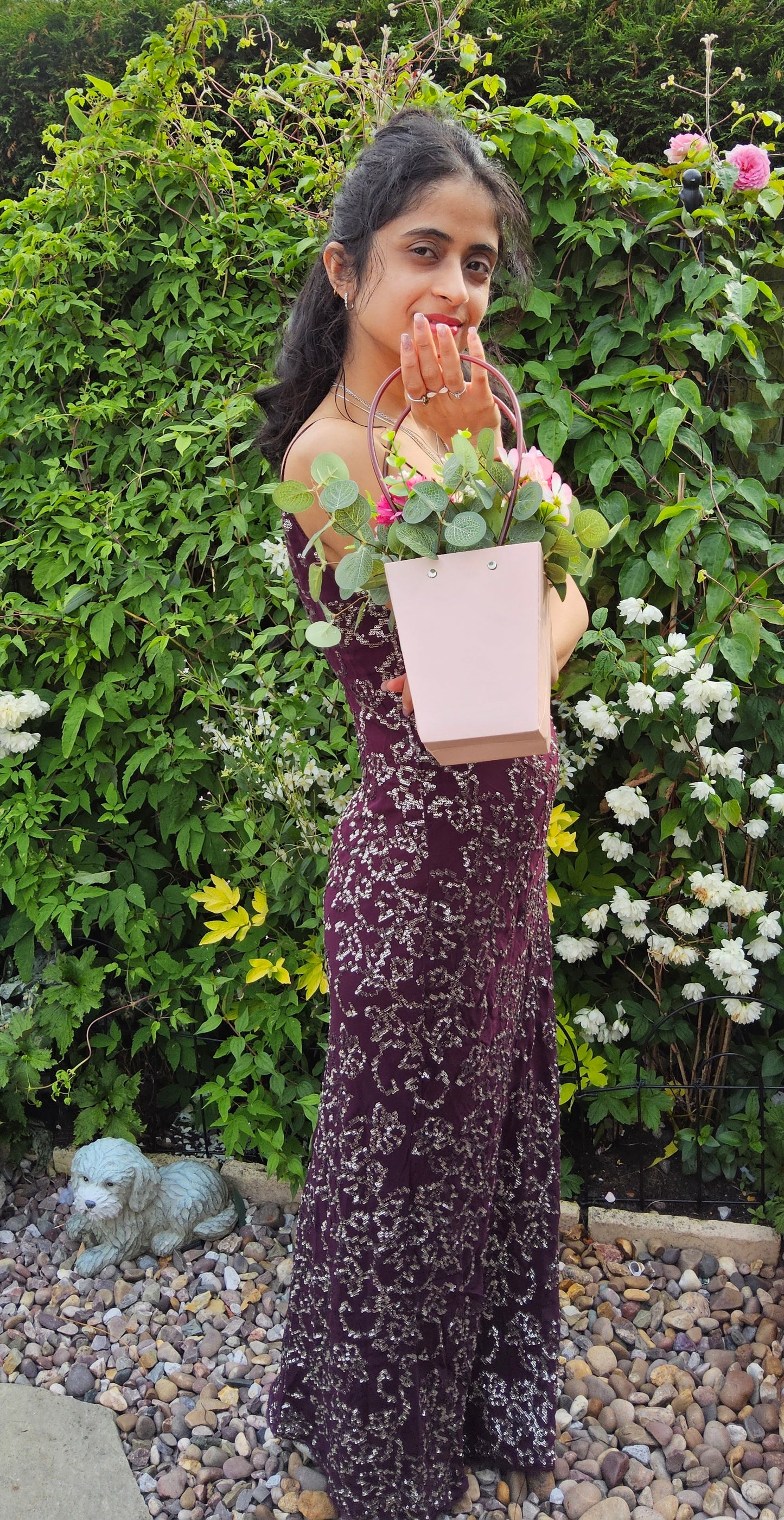 Out in the Town with these flowers in a pink handbag